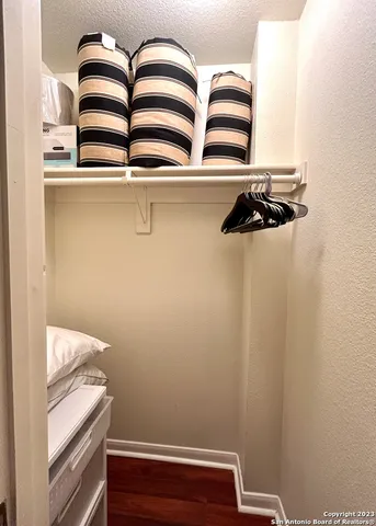 a view of small space with racks on the wall