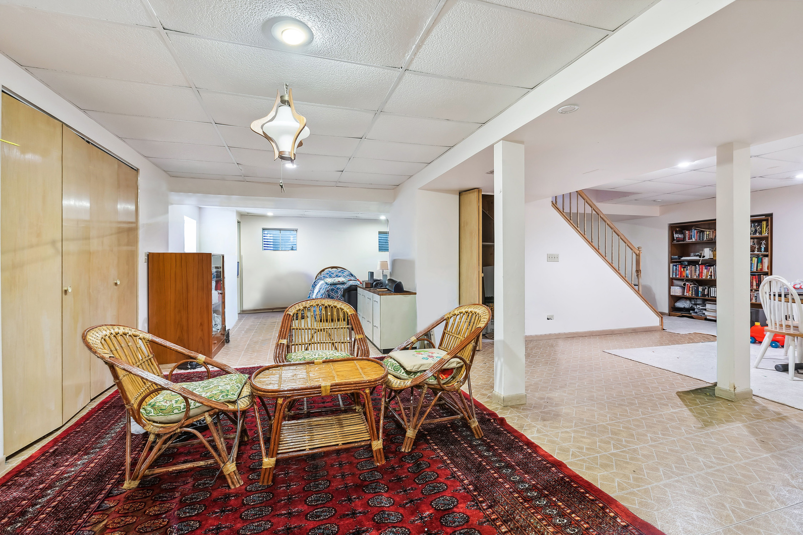 497 Farm Bridge Road Lake Zurich, IL 60047 - Photo 20 of 27 a view of a dining room with furniture and a chandelier