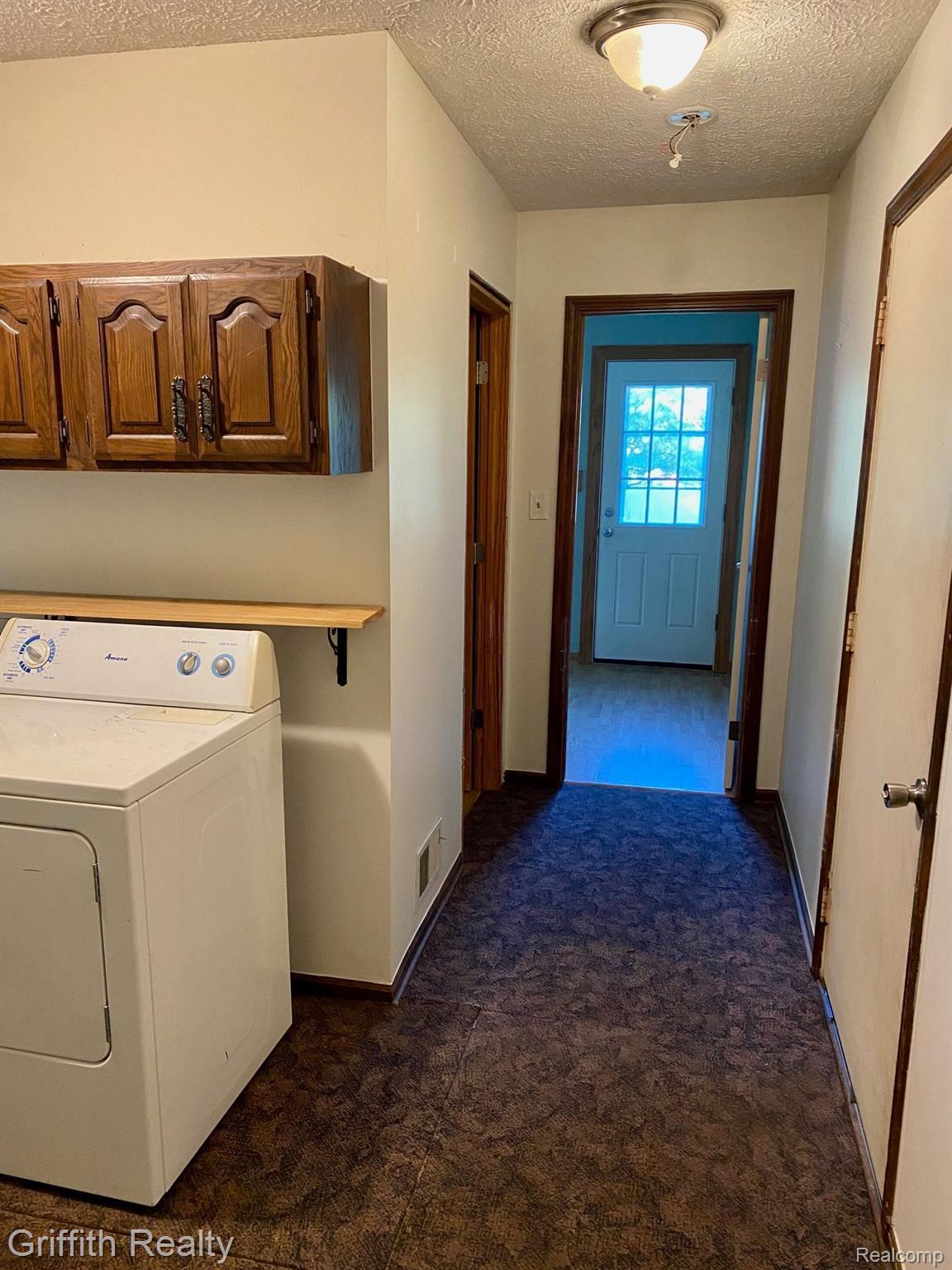5761 Warner Road Fowlerville, MI 48836 - Photo 49 of 63 Laundry is also conveniently located to Grg & Libr