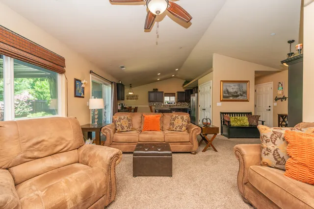 a kitchen with a table and chairs