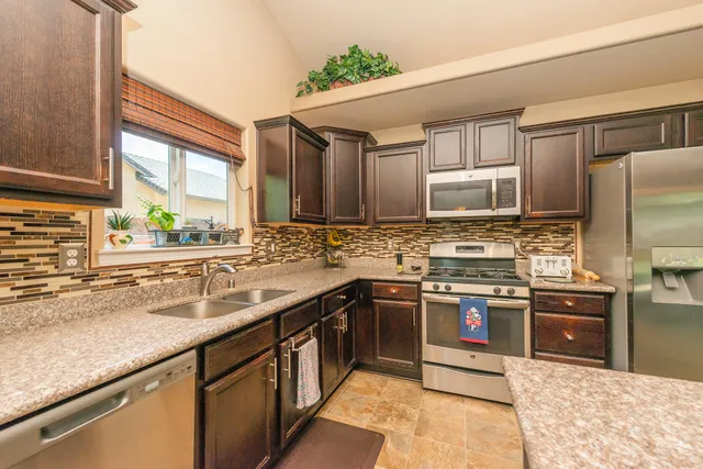 a view of a dining room with furniture window and outside view