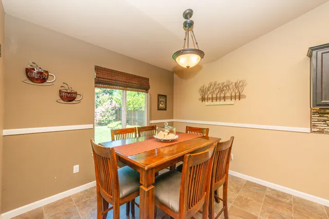 a view of a dining room with furniture