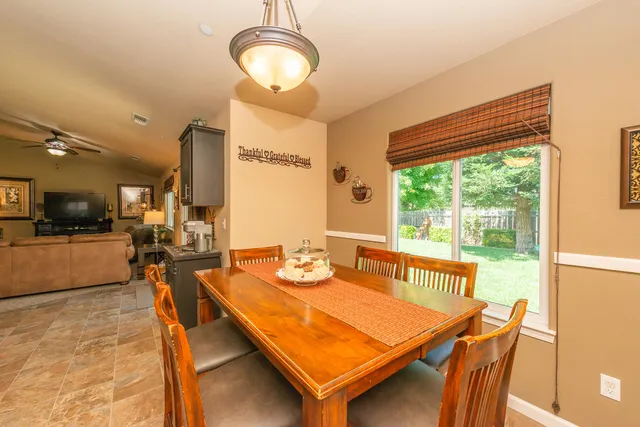 a view of a bathroom with a shower curtain