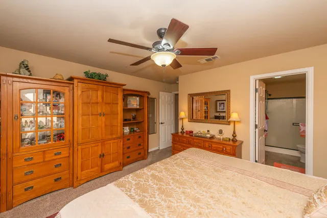 a view of a house with a yard porch and sitting area