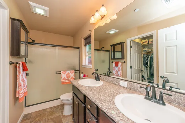 a view of a backyard with sitting area