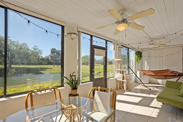 a view of a balcony with furniture
