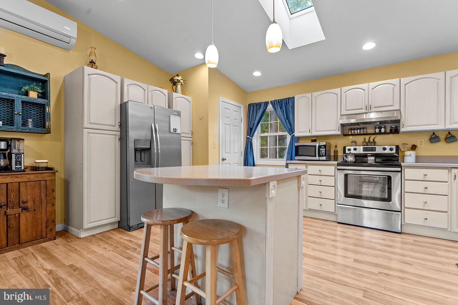 12483 Newland Road Warsaw, VA 22572 - Photo 9 of 38 Kitchen Island