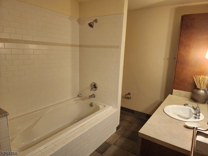 1 Pine Crescent, Unit 23 Vernon, NJ 07462 - Photo 21 of 28 a bathroom with a sink and a toilet