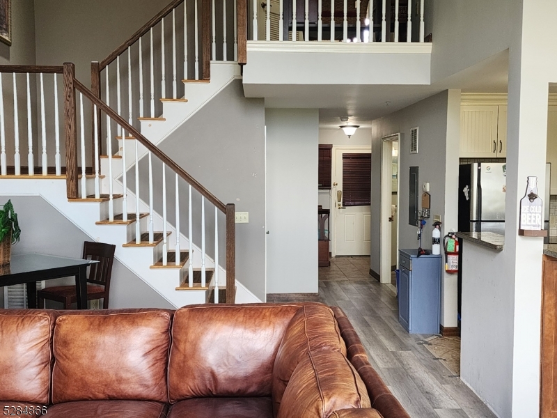 1 Pine Crescent, Unit 23 Vernon, NJ 07462 - Photo 6 of 28 a view of a living room and entryway with furniture