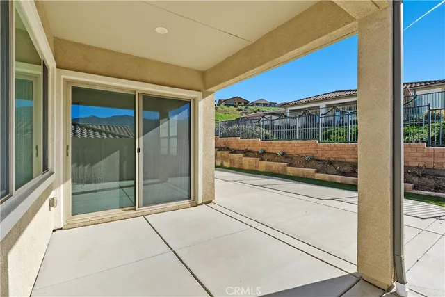 a view of a glass door with a balcony