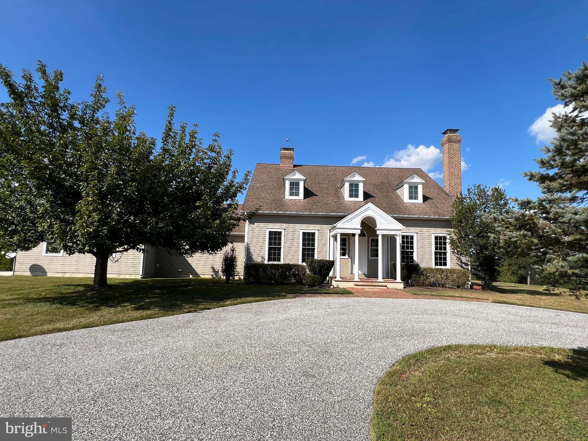 1343 Phoenix Road Sparks Glencoe, MD 21152 - Photo 1 of 57 a front view of a house with a garden