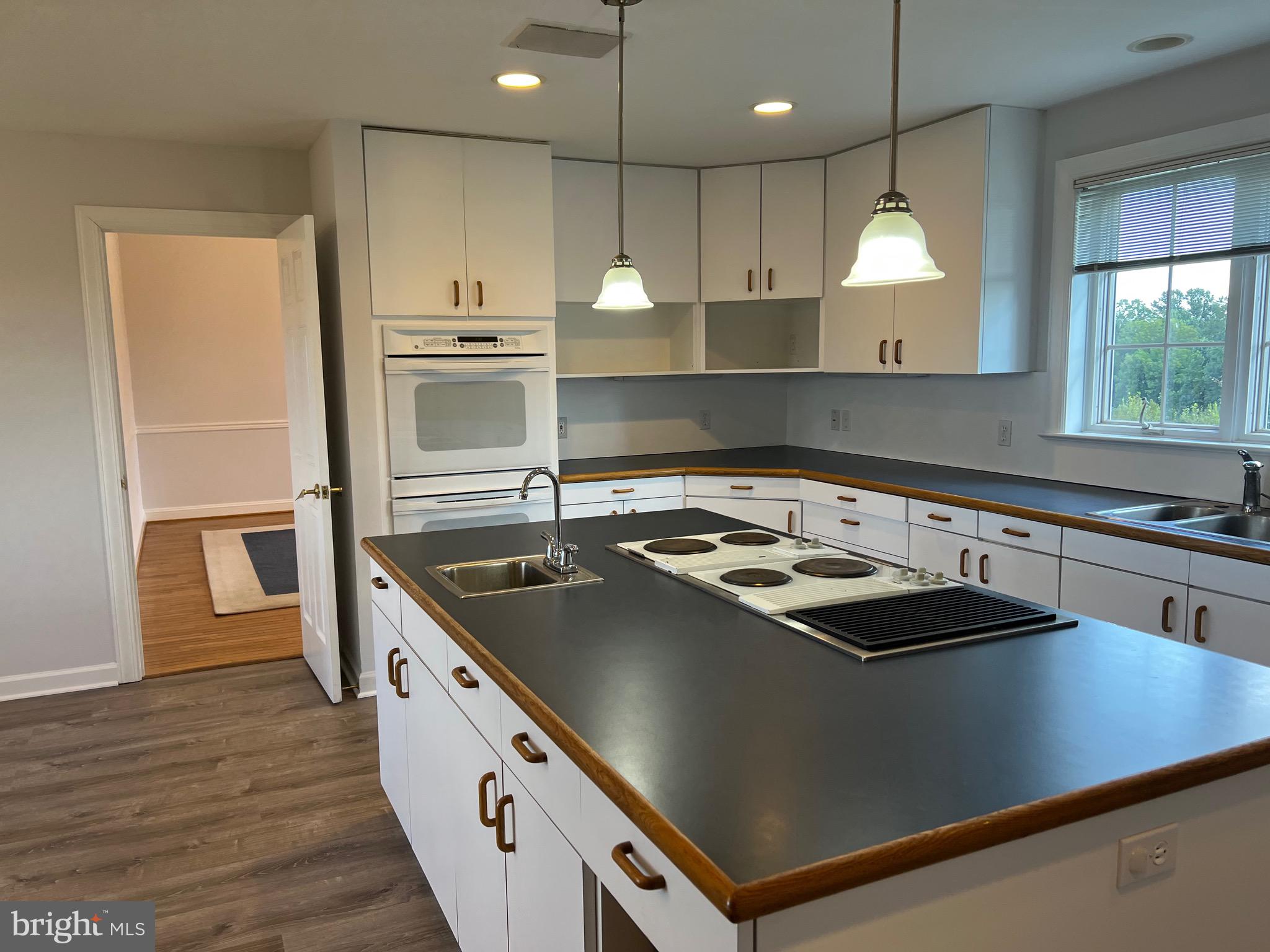 1343 Phoenix Road Sparks Glencoe, MD 21152 - Photo 15 of 57 a kitchen with a stove and a sink