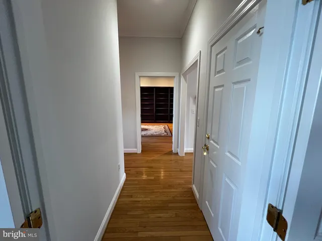 a view of a livingroom with furniture and staircase