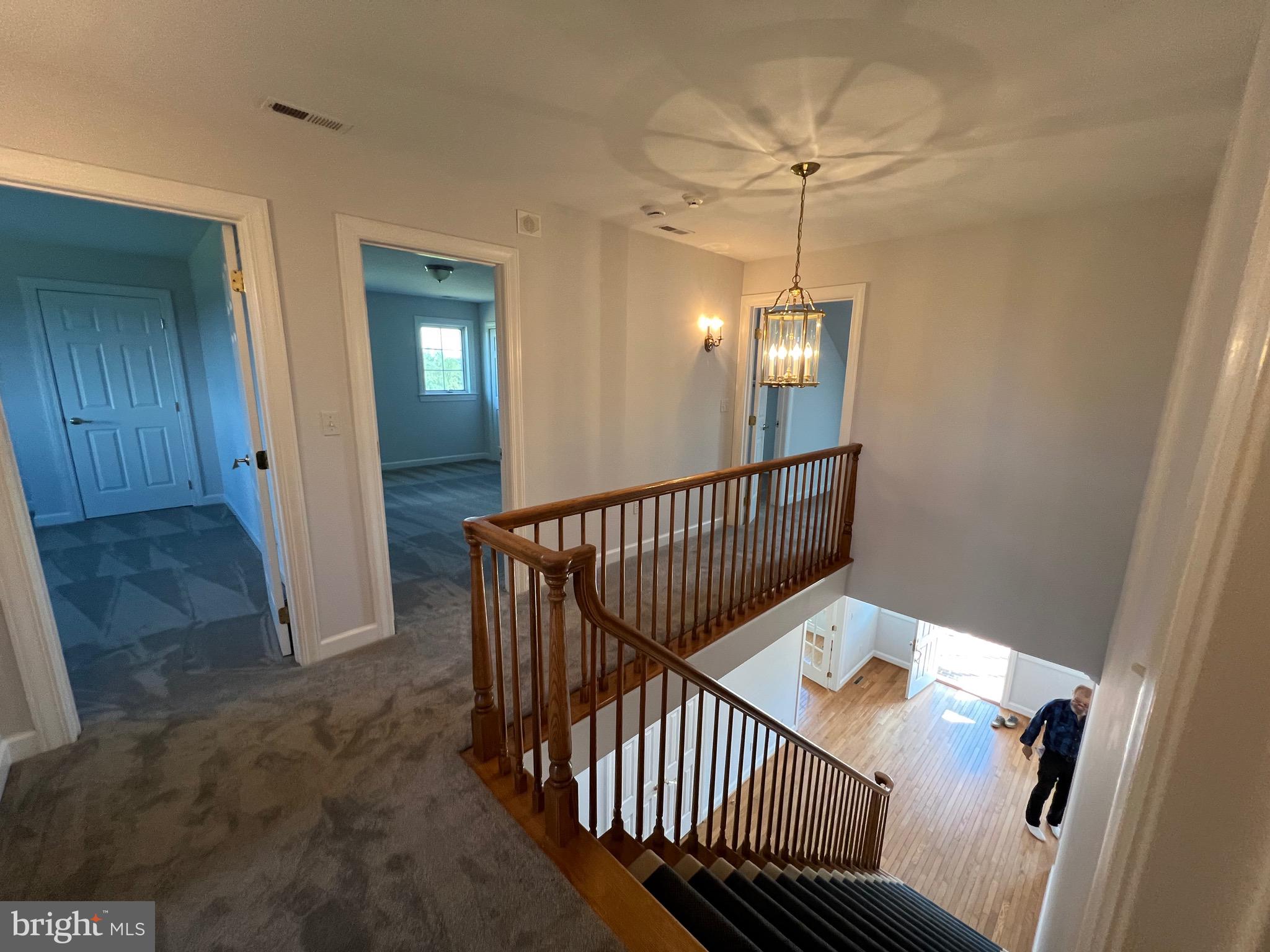 1343 Phoenix Road Sparks Glencoe, MD 21152 - Photo 27 of 57 a view of a hallway with wooden floor and stairs
