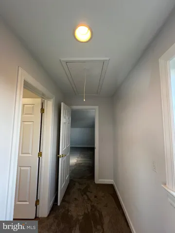 a bathroom with a sink vanity granite tub and a shower