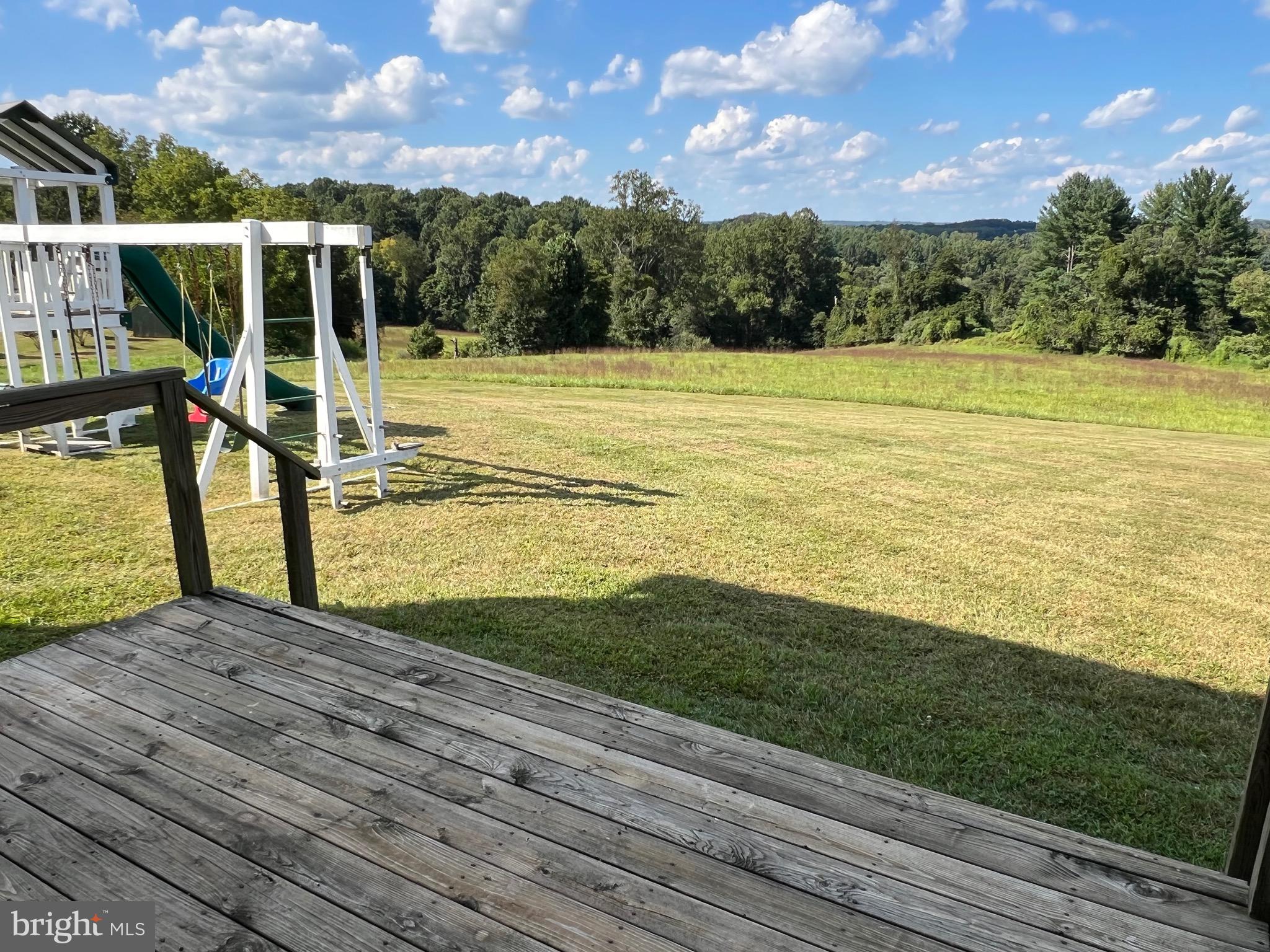 1343 Phoenix Road Sparks Glencoe, MD 21152 - Photo 54 of 57 a view of a swimming pool with an outdoor seating and a garden