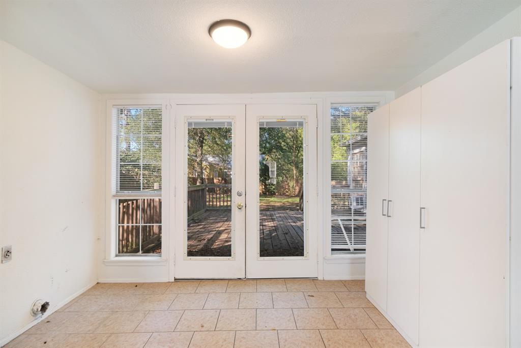 2413 Simpson Street Paris, TX 75460 - Photo 12 of 15 an empty room with windows