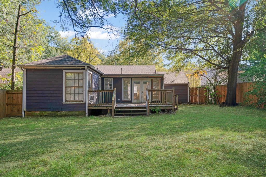 2413 Simpson Street Paris, TX 75460 - Photo 13 of 15 a view of a house with a yard
