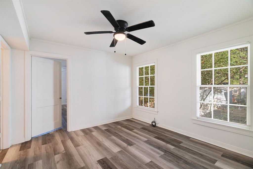 2413 Simpson Street Paris, TX 75460 - Photo 8 of 15 a view of an empty room with a window