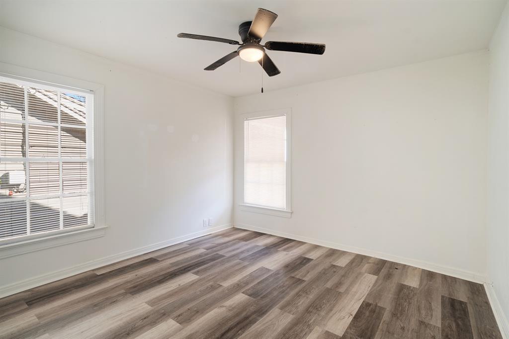 2413 Simpson Street Paris, TX 75460 - Photo 10 of 15 a view of empty room with ceiling fan