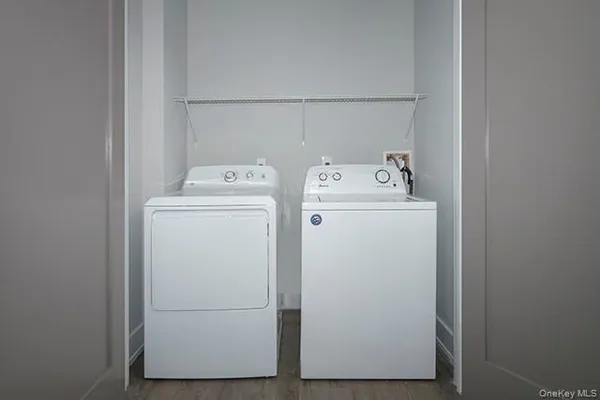 a utility room with dryer and washer