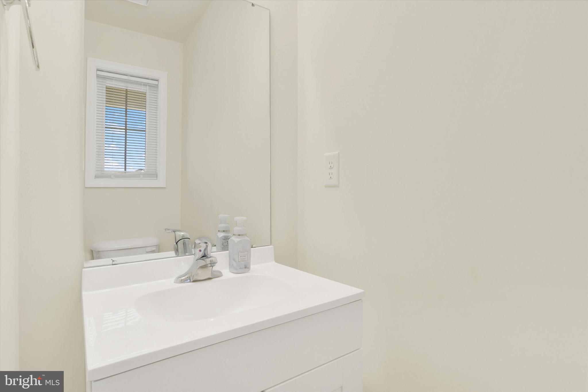 48 Dustin Drive Halifax, PA 17032 - Photo 11 of 31 a bathroom with a sink and a mirror