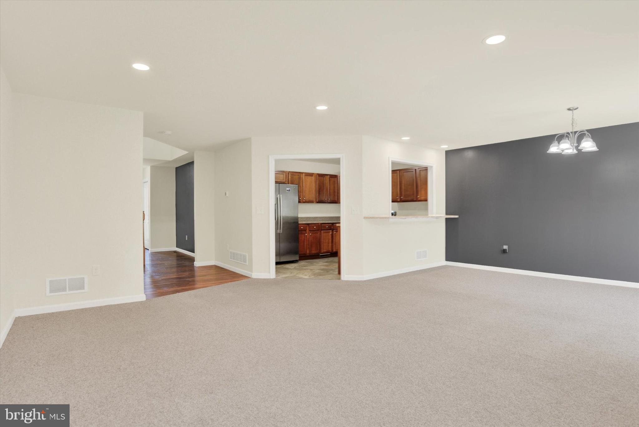 48 Dustin Drive Halifax, PA 17032 - Photo 4 of 31 a view of an empty room with a kitchen