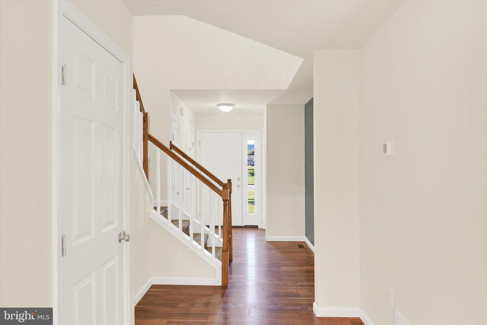 48 Dustin Drive Halifax, PA 17032 - Photo 10 of 31 a view of staircase with wooden floor and white walls