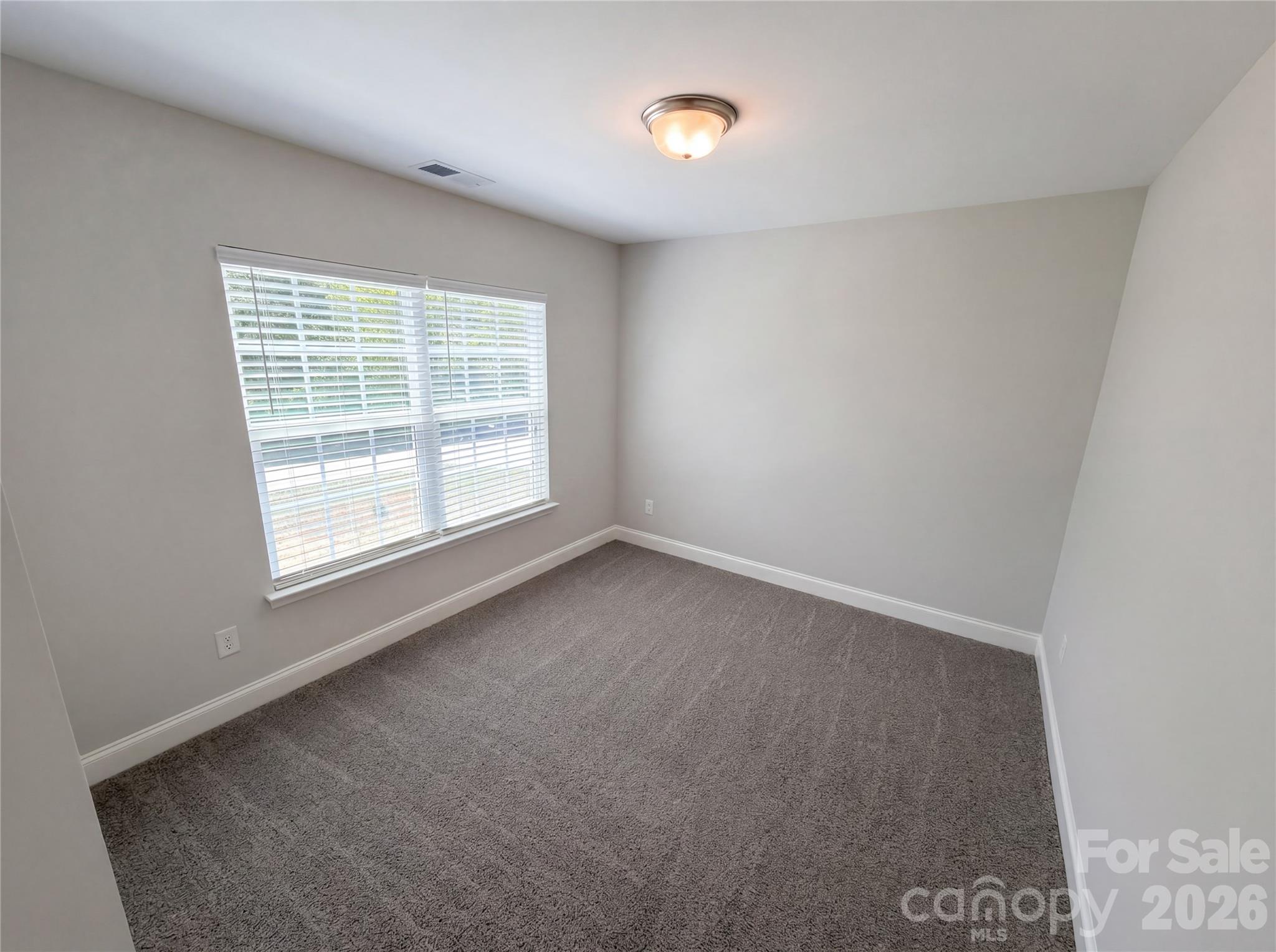 4918 Griffith Road Monroe, NC 28112 - Photo 10 of 17 an empty room with a window