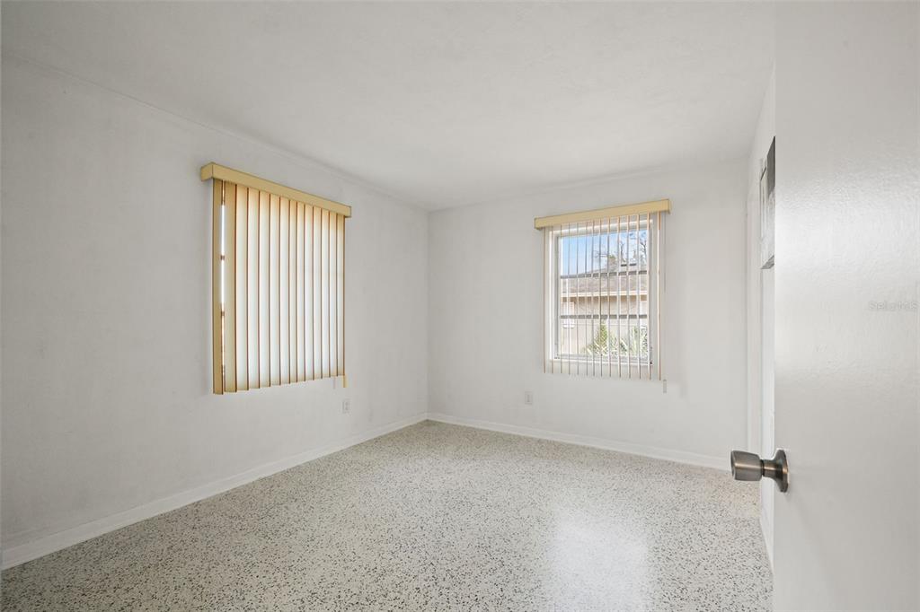 6422 Fairlawn Street Spring Hill, FL 34606 - Photo 18 of 43 an empty room with a window