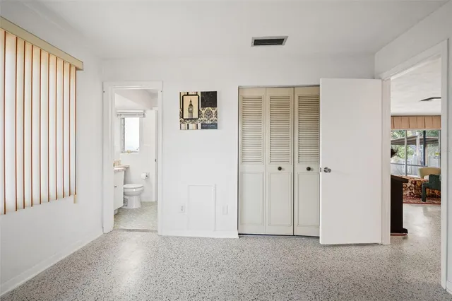 a view of a room with tub and workspace