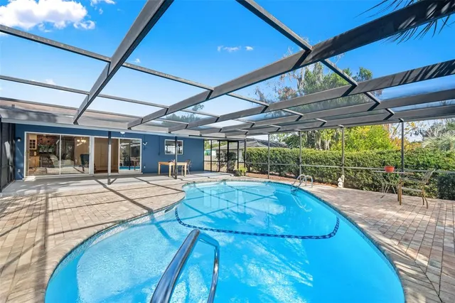 a view of indoor pool and sitting area