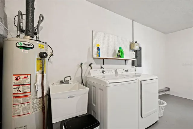 a utility room with dryer and washer