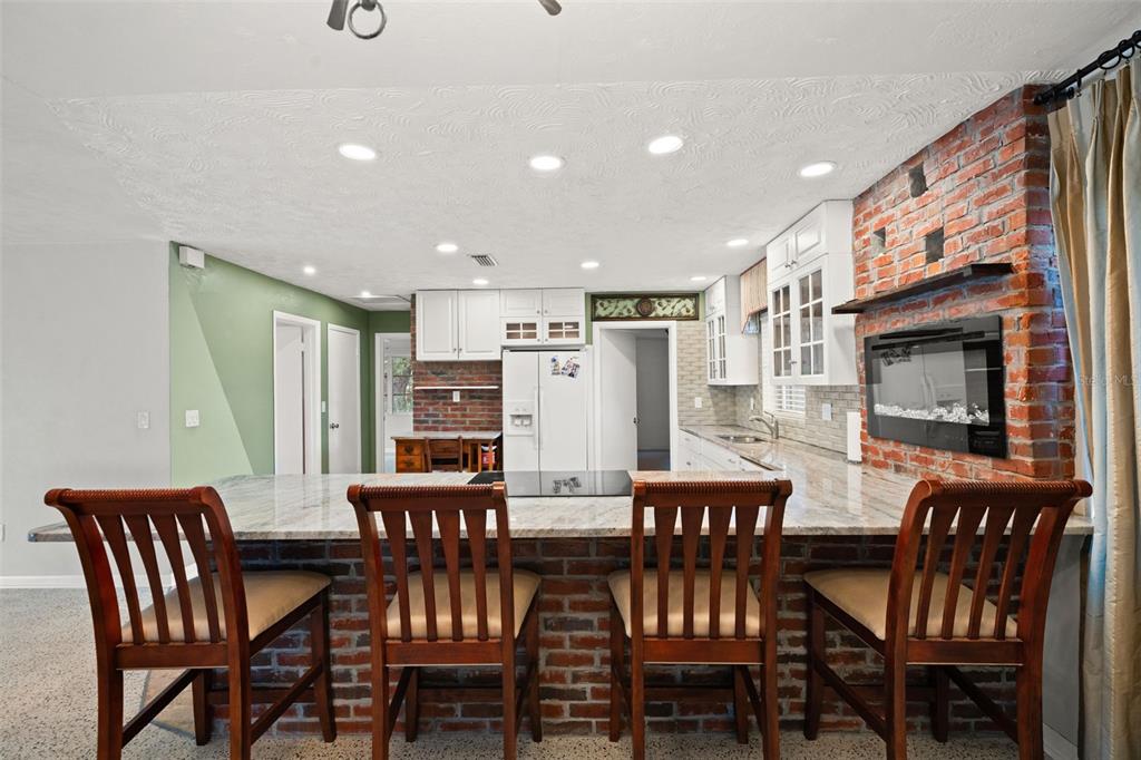 6422 Fairlawn Street Spring Hill, FL 34606 - Photo 8 of 43 a view of a dining room with furniture