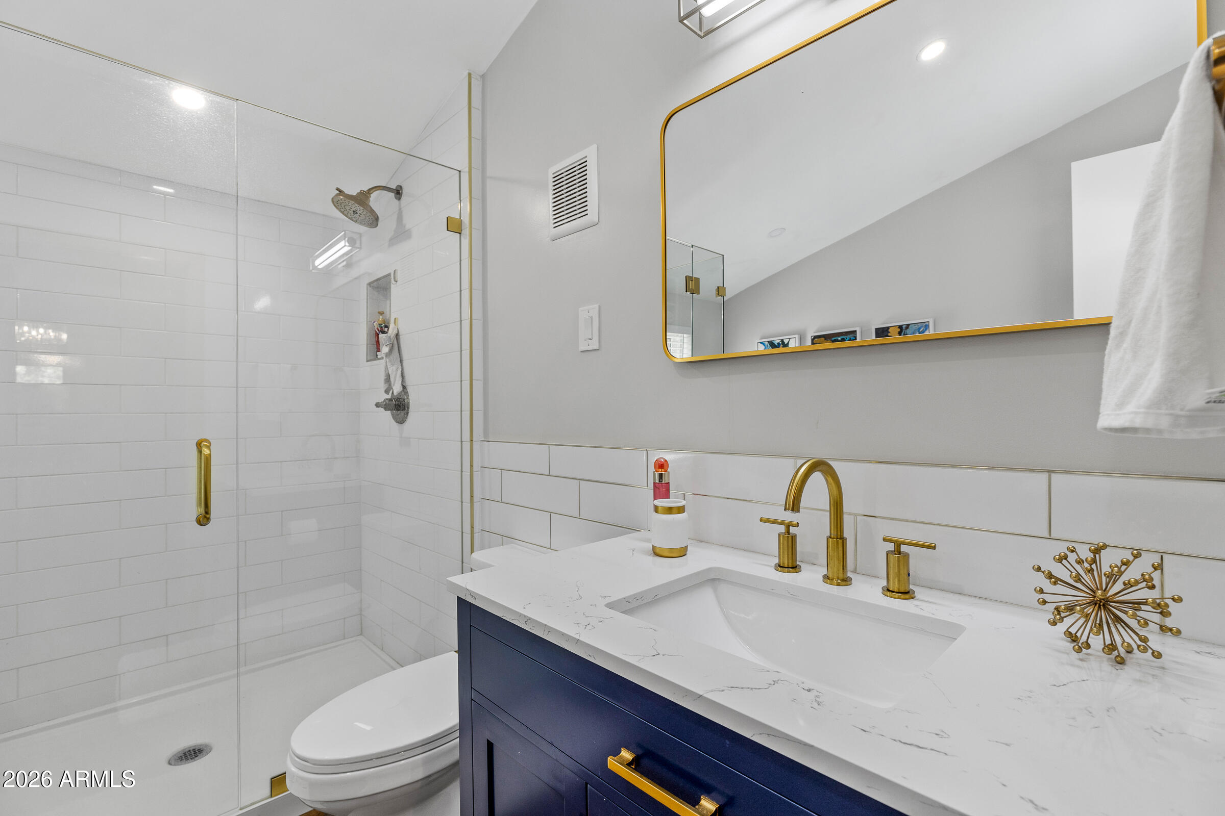 755 East Meadow View Road Munds Park, AZ 86017 - Photo 25 of 35 a bathroom with a sink a toilet and shower