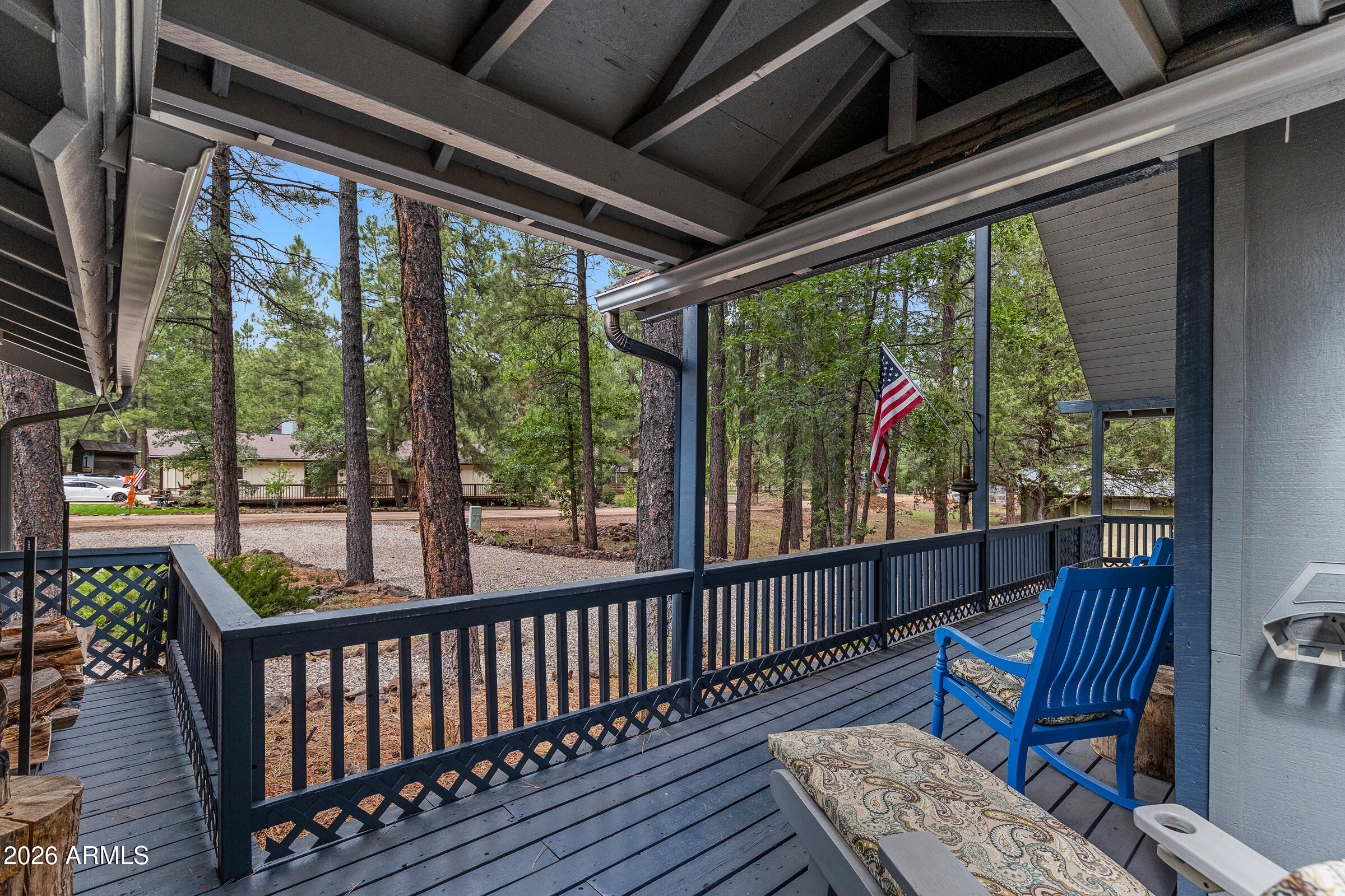 755 East Meadow View Road Munds Park, AZ 86017 - Photo 5 of 35 a view of a two chairs in the balcony