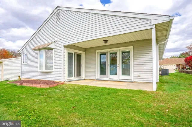 a front view of house with yard