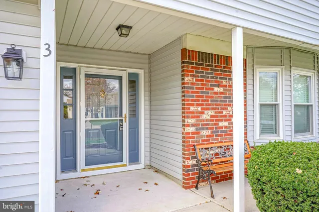 a view of a door and a window