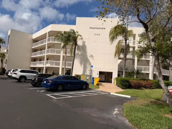 a car parked in front of a building