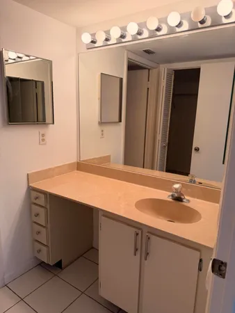 a bathroom with a shower and a bath tub