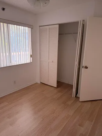 a view of a refrigerator in kitchen
