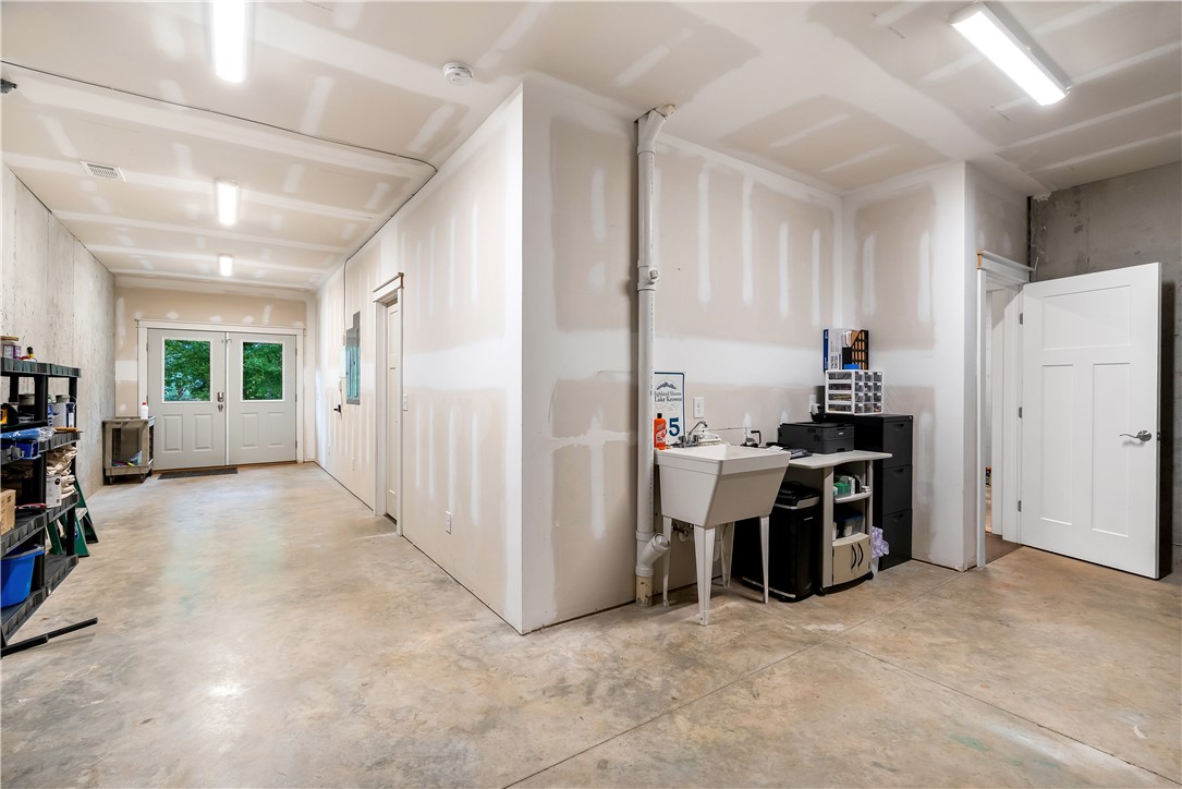 329 High Hampton Road Salem, SC 29676 - Photo 41 of 47 A spacious basement workshop area with poured concrete floors and direct outdoor access.