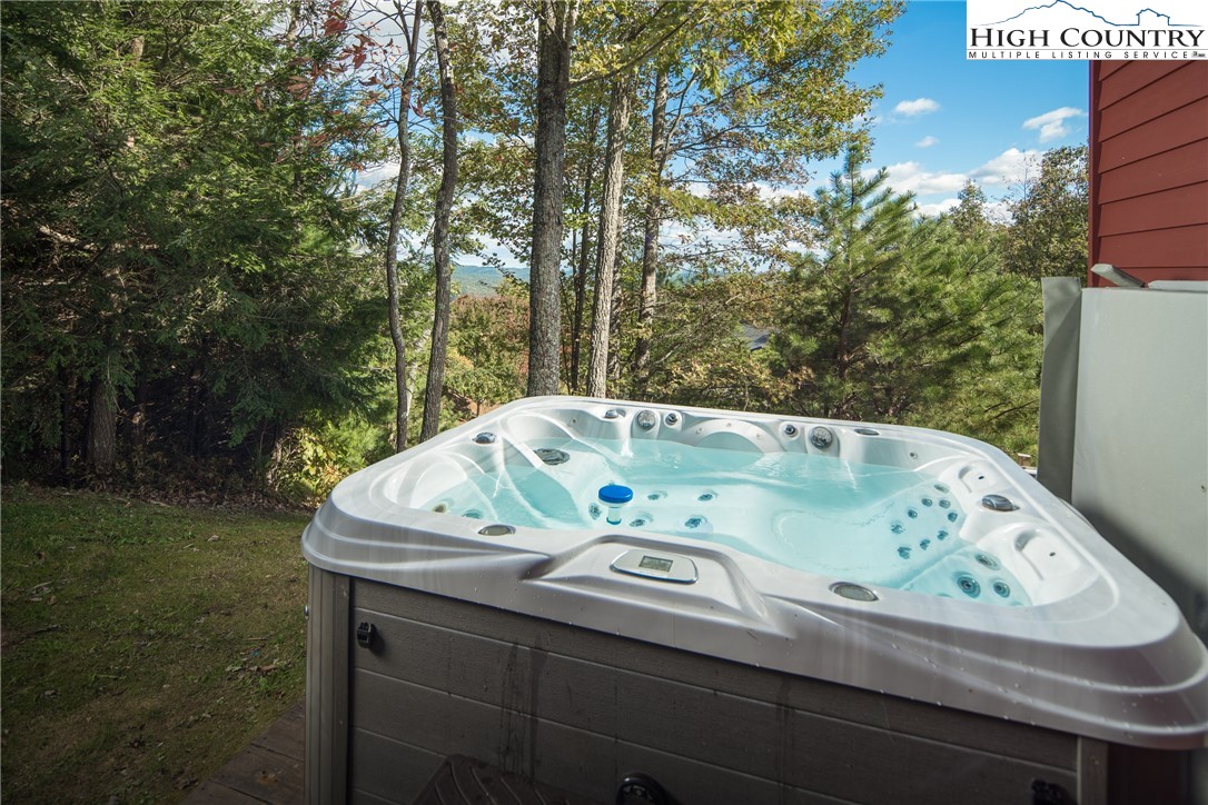1253 Goldenrod Road Boone, NC 28607 - Photo 21 of 48 a view of barbeque grill with tub and trees around
