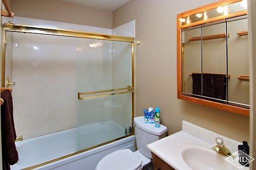 907 Red Sandstone Road, Unit 9C Vail, CO 81657 - Photo 5 of 7 a bathroom with a sink toilet and shower