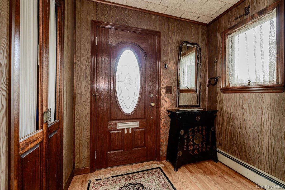 1815 Meadowbrook Road Merrick, NY 11566 - Photo 2 of 25 Entrance Foyer with Closet and room for more
