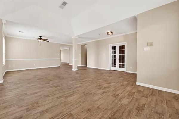 a view of an empty room with a window