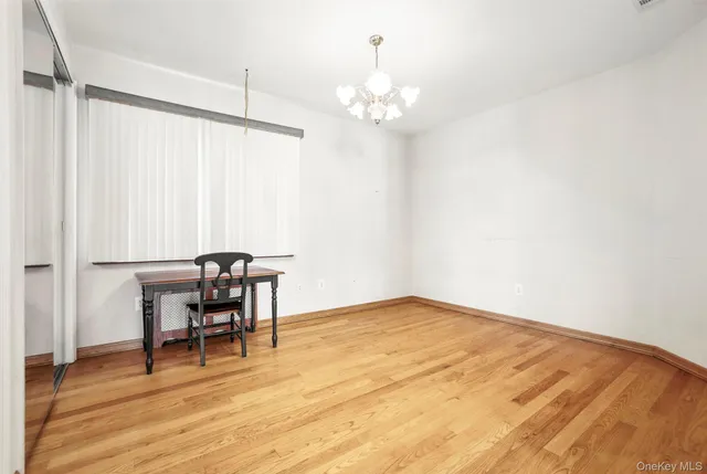 a view of a livingroom with furniture and wooden floor