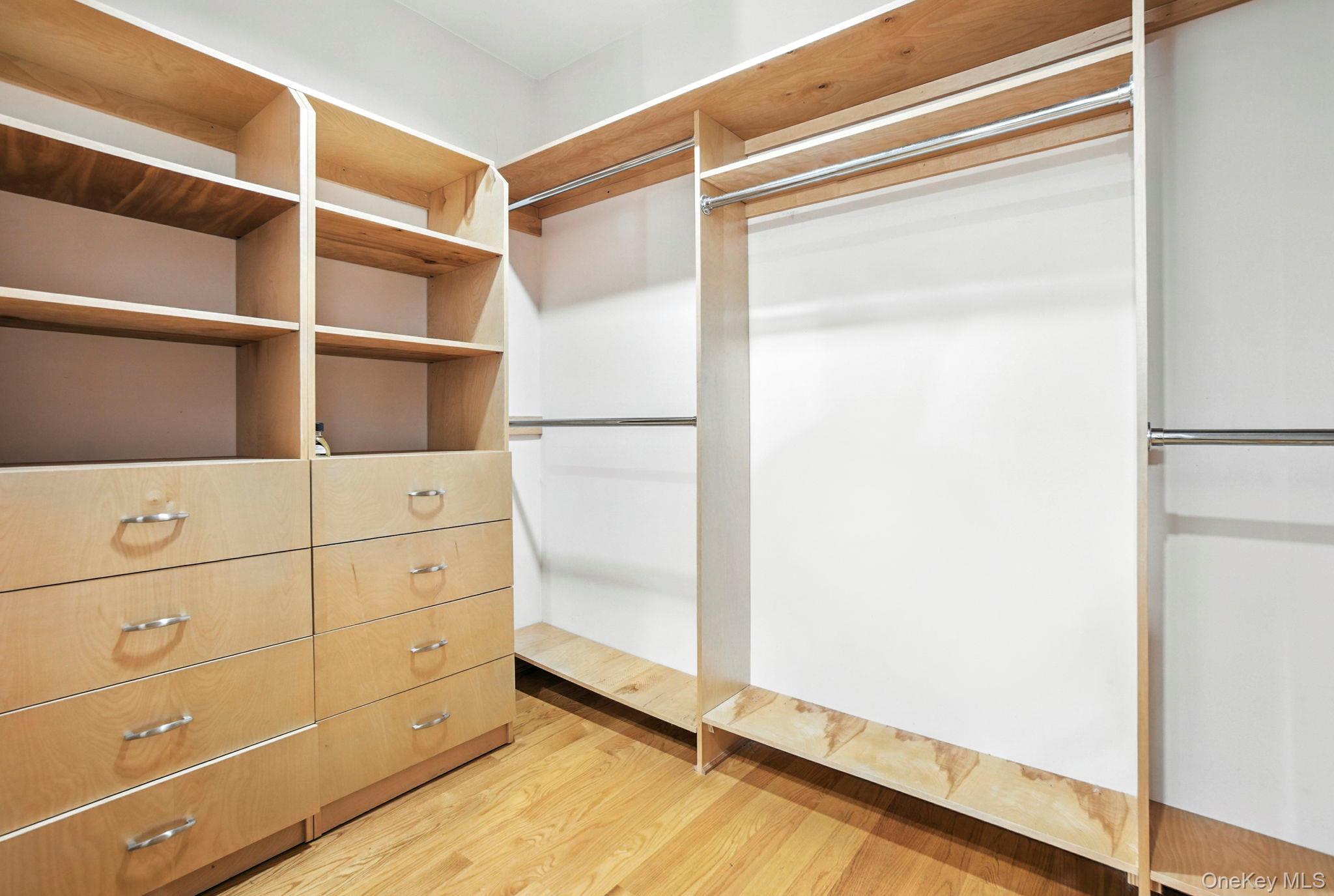 77-16 Kew Forest Lane Queens, NY 11375 - Photo 8 of 28 a view of an empty walk in closet