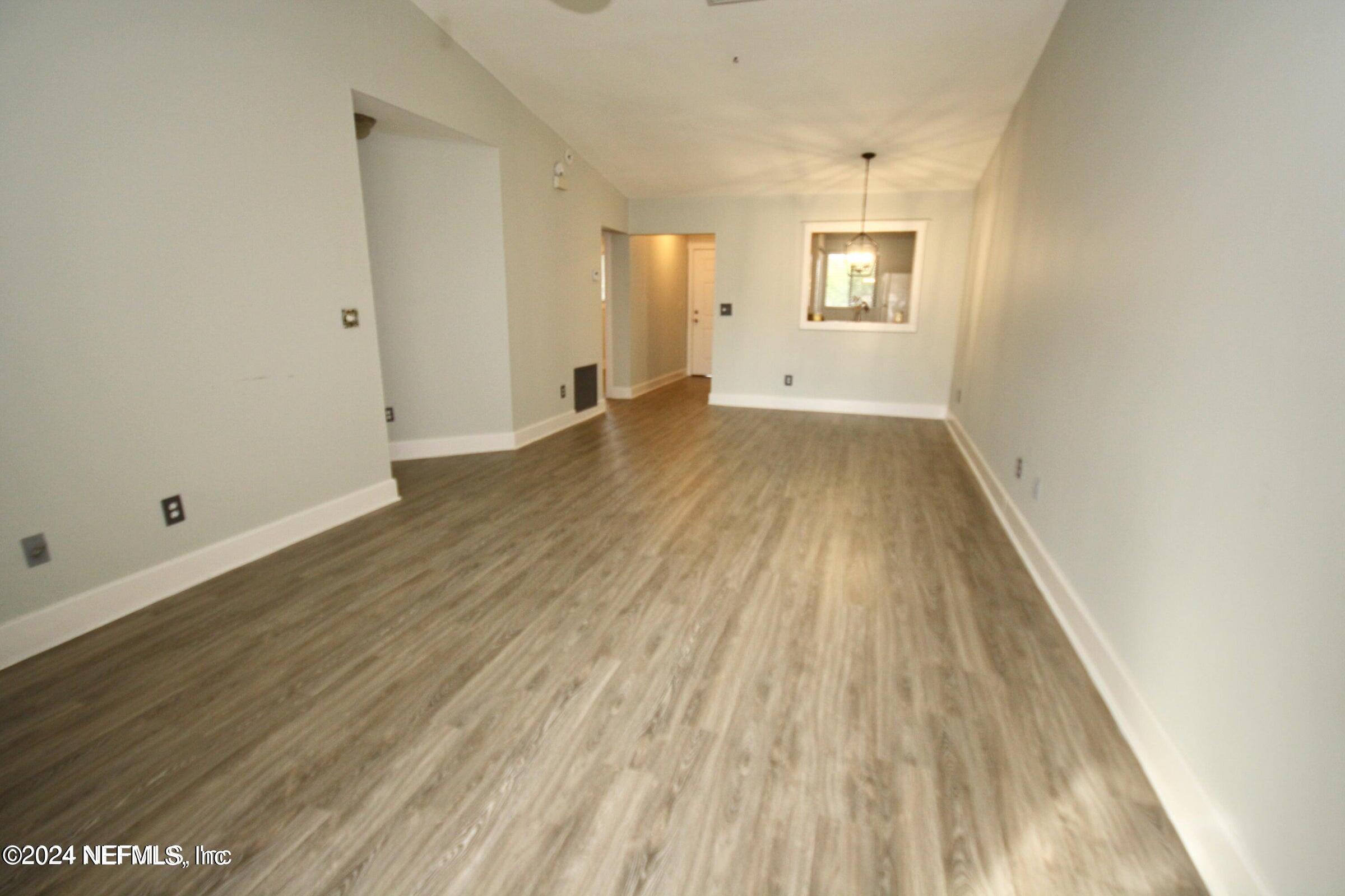 2012 Sea Hawk Circle Ponte Vedra Beach, FL 32082 - Photo 2 of 13 a view of a room with wooden floor and window