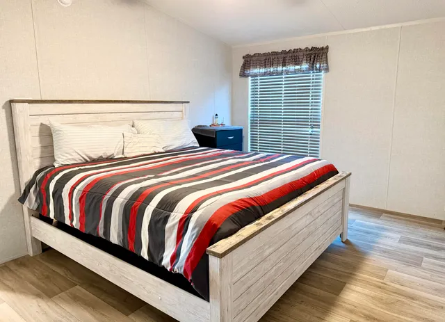 a view of cabinets and wooden floor